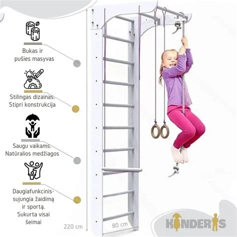 vaikas laikosi ant gimnastikos žiedų