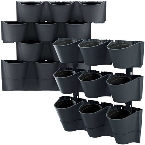 Vertikalūs vazonai su gėlėmis