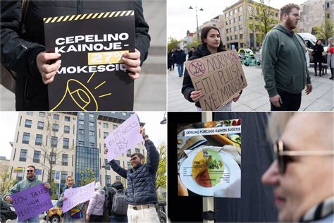 Protestuotojai su plakatais prie Aukščiausiojo Teismo