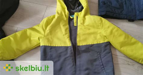 Vaikiškos striukės priežiūros etiketė