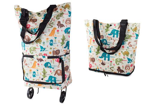 Vežimėlio rankinė su daiktais