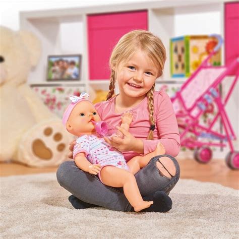 kūdikis su gėlėmis