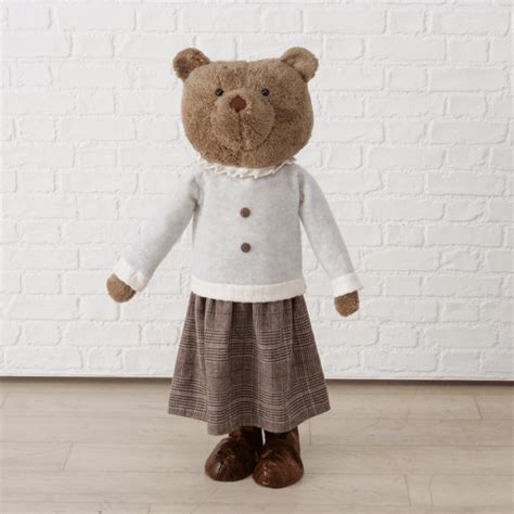 Simbolinis meškiukas ant megztinio