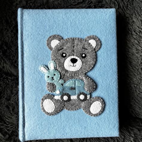 vaikiškas albumas su meškiuku